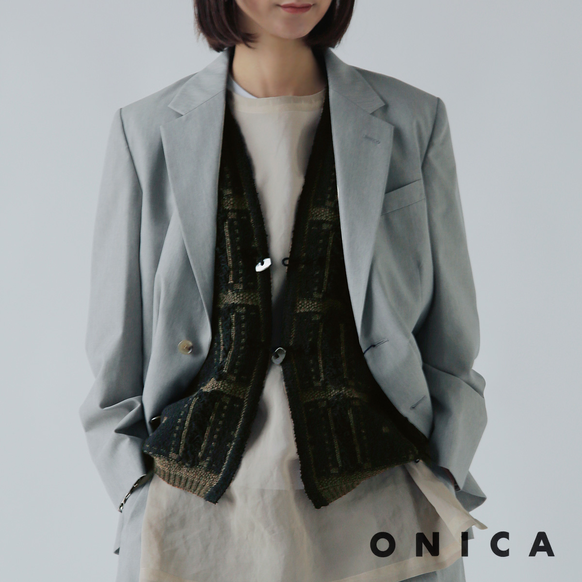 ONICA(IjJ)E[ Rbg ubNWK[h jbg xXg gBlocked Jacquard Vesth oni055