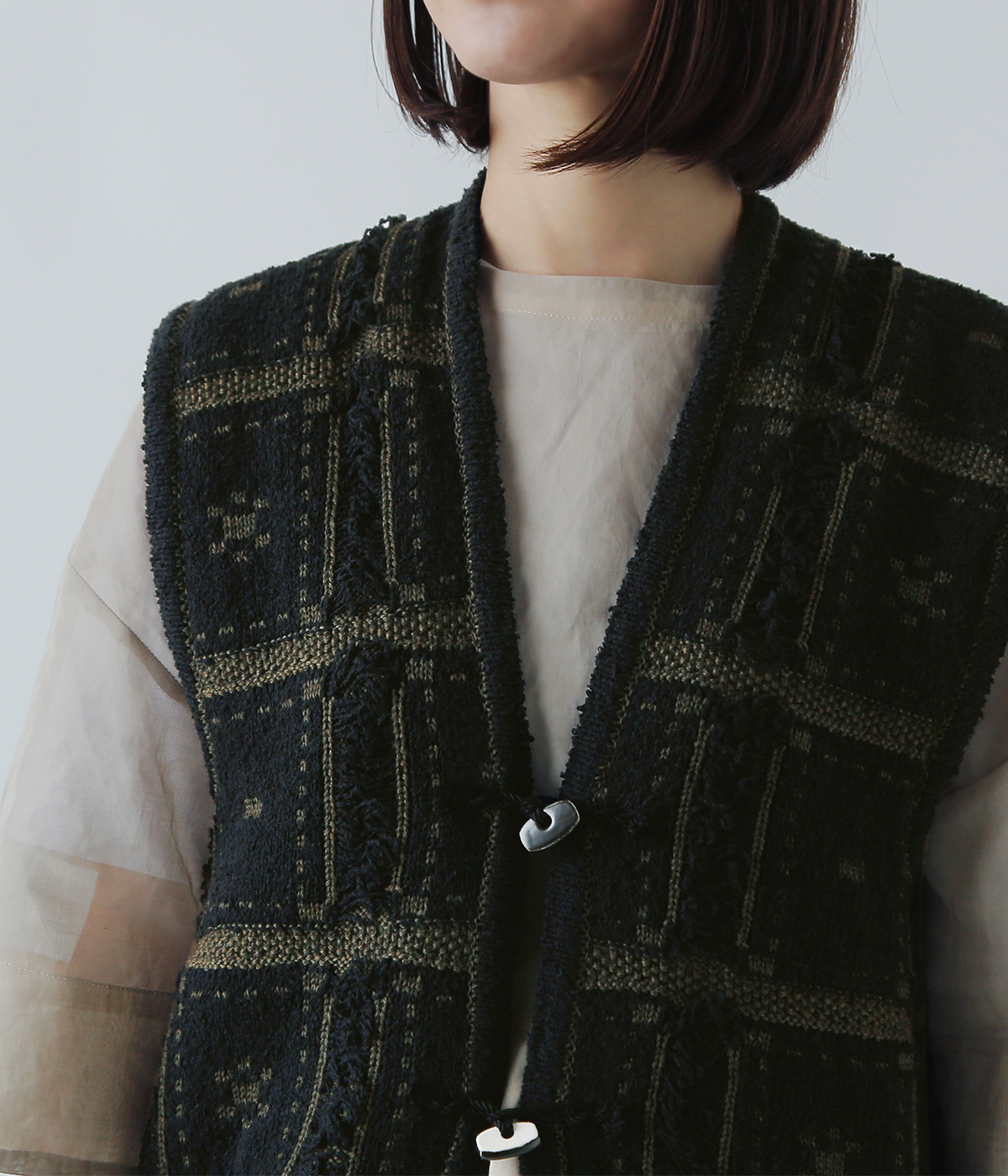 ONICA(IjJ)E[ Rbg ubNWK[h jbg xXg gBlocked Jacquard Vesth oni055