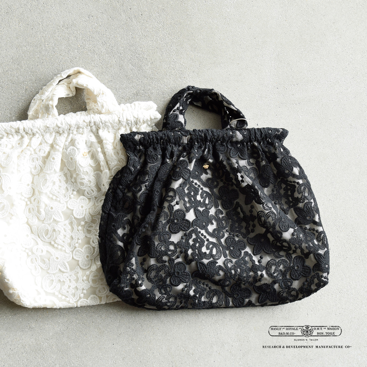 R & D.M.Co-(I[h}Ye[[)NE `[t [X obO gCROWN MOTIF LACE BAGh 7532