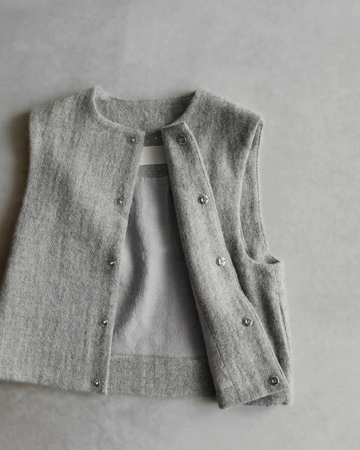COSMIC WONDER(�R�Y�~�b�N�����_�[)�V�F�b�g�����h�E�[�� �x�X�g Nostalgic painters winter vest 24cw09025