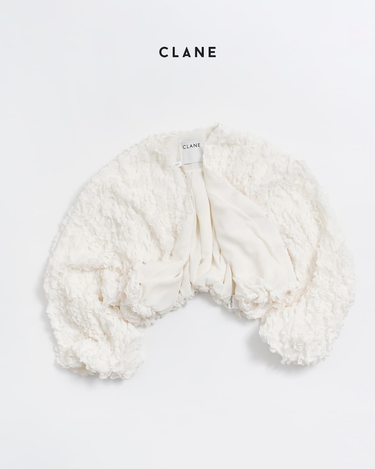 CLANE(クラネ)トップステッチ フリル ボレロ10103-0443