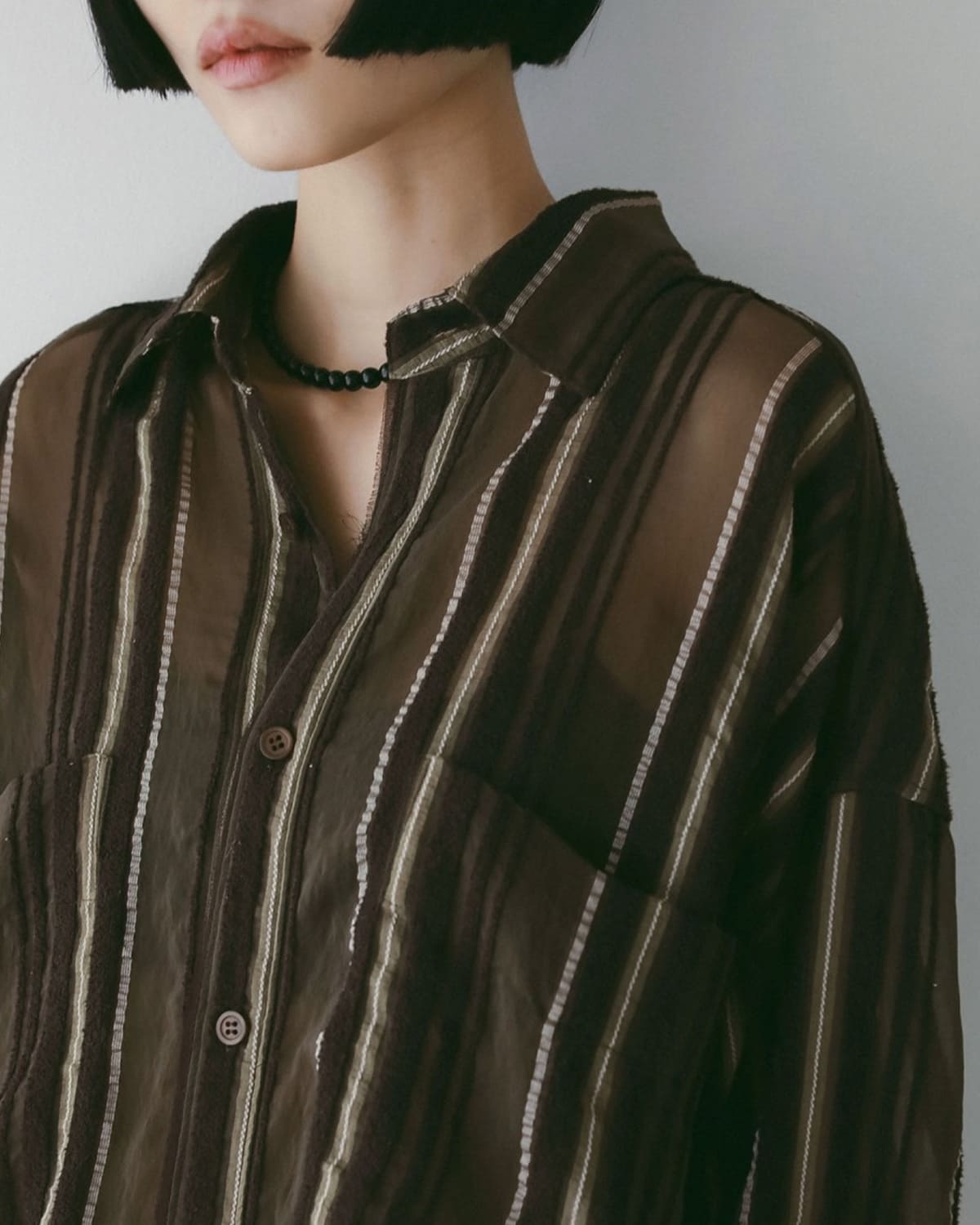 anuke(アンヌーク)シアーストライプオーバーシャツSheerStripeShirt 62520424