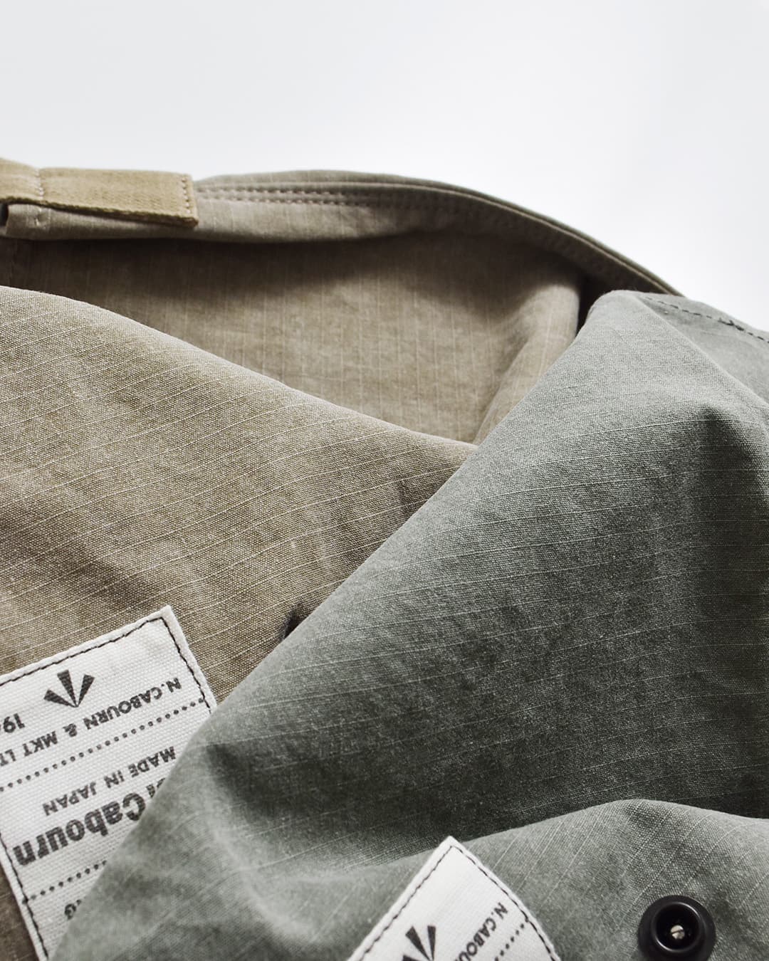 NIGEL CABOURNリップストップピグメントダイ マルチバッグ 8052-00-61001