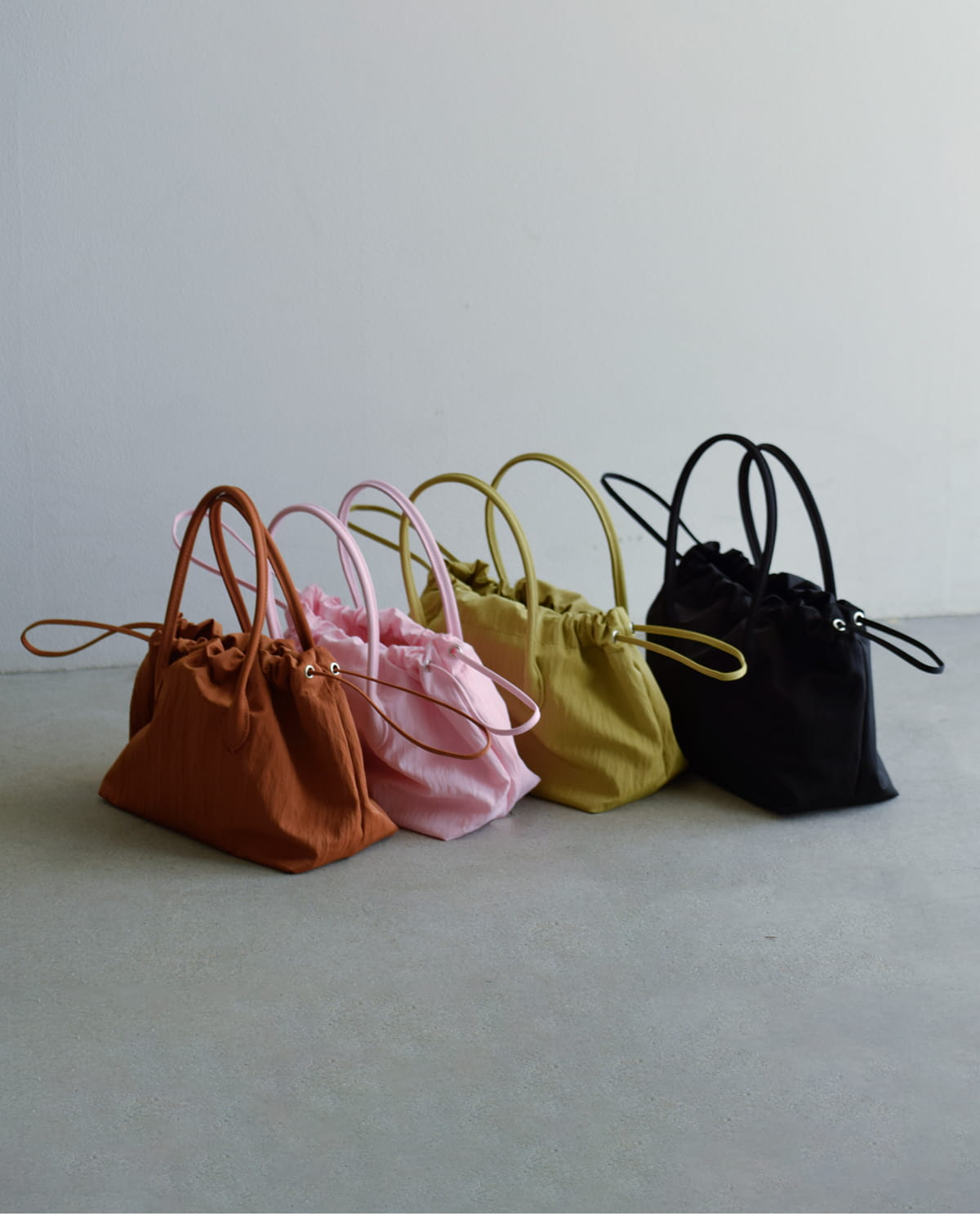 MARY AL TERNAリサイクルナイロン 巾着 2way ハンドバッグ “WRING” ma6123bg-38